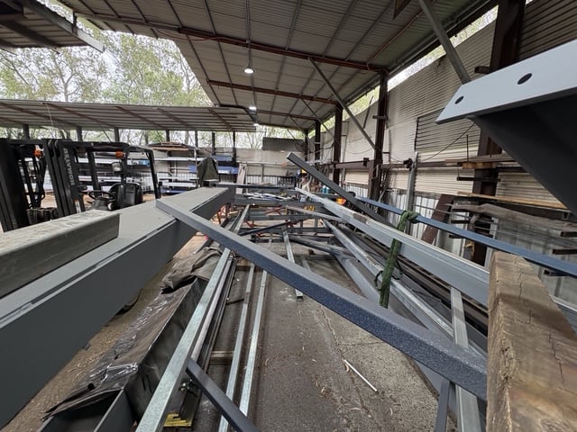 Close-up of a fabricated steel frame under construction at the Marshall Steel workshop