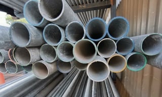 Galvanised round pipe stack end-on at Marshall Steel